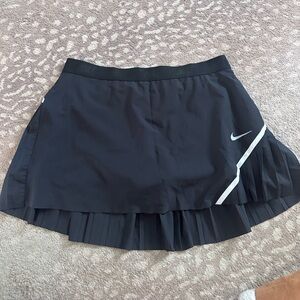 Nike Women's Black Golf Skort with Pleated Hem